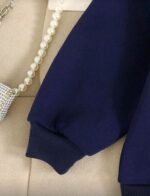 ⁦بلوزة كحلي فيونكات⁩ - الصورة ⁦5⁩